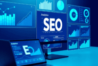 A modern digital workspace with transparent screens showing abstract graphs, a sleek laptop, and smartphone in cool blue and green tones.